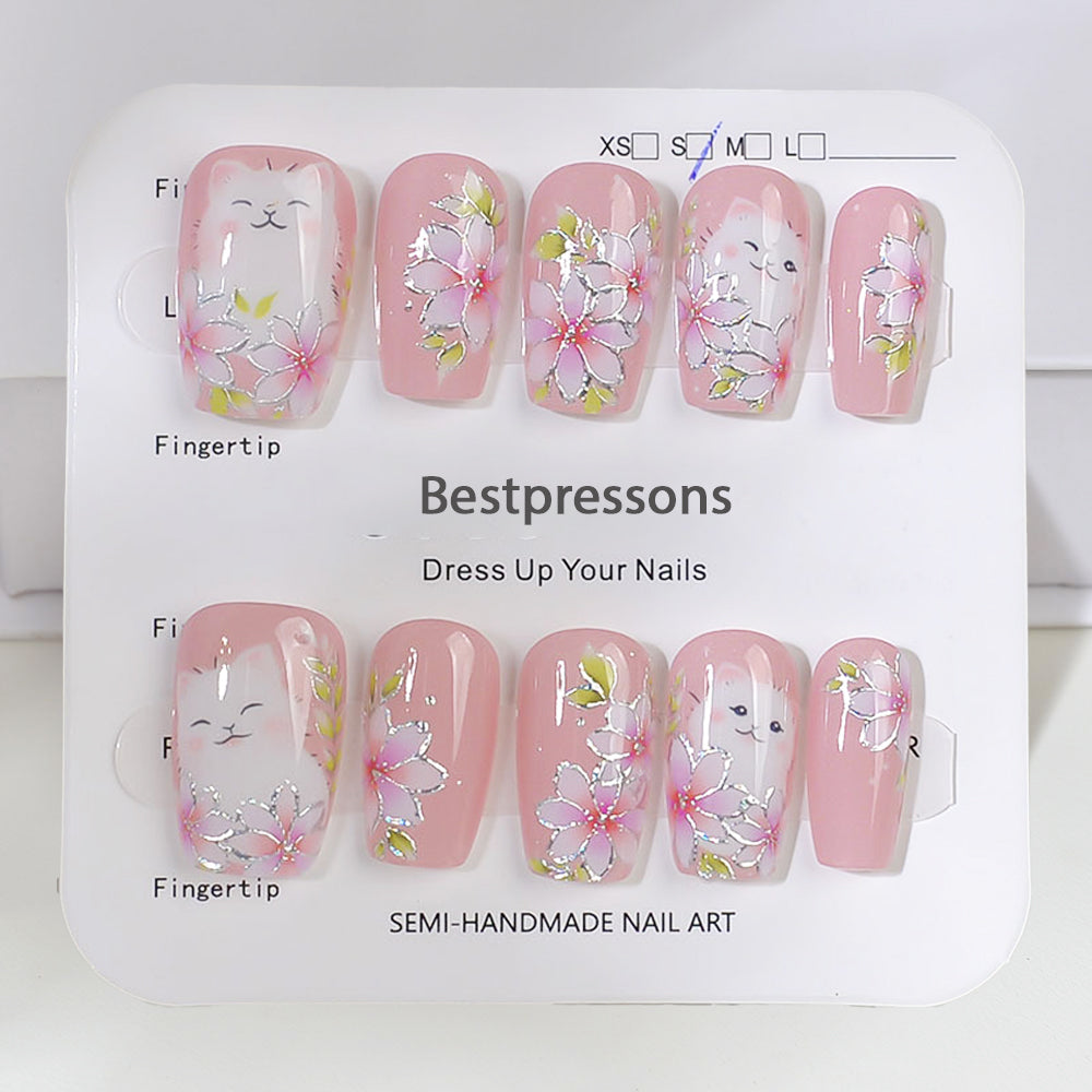 cat design nail art on flowers and pink base color press on nails in short coffin shape