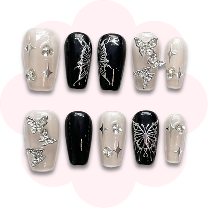 gothic inspired coffin ballerina press on nails featuring metallic butterfly charms.long lasting and reusable