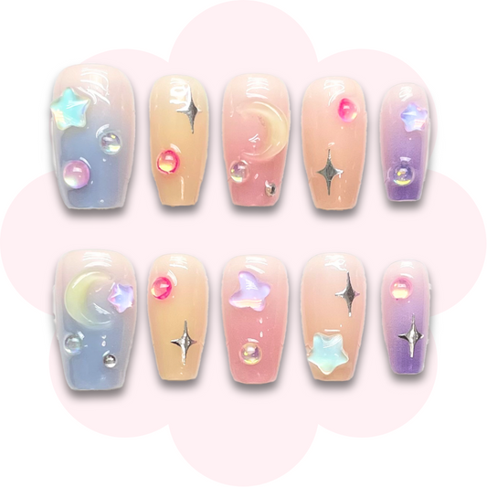 pastel rainbow press on nails in short coffin ballerina shape featuring moon and star accents
